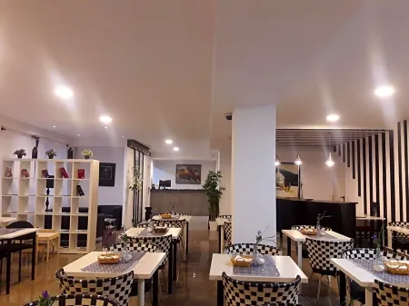 NAP Carta Puebla Отели рядом с достопримечательностью «Church of Santa María de la Corte»