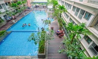 Comfortable Pool View Studio Room at Gateway Park LRT City Bekasi Apartment