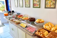 Estalagem 11 Suites - Aamiainen