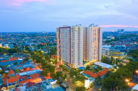 Starlight Studio at Gunawangsa Apartment Отели в г. Sukolilo