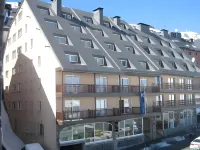 Apartamentos Caribou Hotel a 