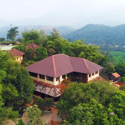 Wayanad Village Resort Отели рядом с достопримечательностью «Водопады Меенмутти»