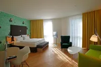 Grimms Hotel Hanau Отели в г. Альценау