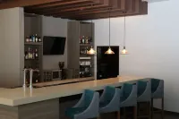 Hampton Inn & Suites by Hilton Puebla - ที่มีบาร์