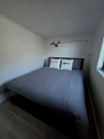 Cosy water view cabin in amongst the pristene wilderness of Central Highlands Hotels in Cradle Mountain