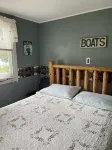 Cottage 2 is a 2 bedroom 25’ from its boat dock & Hamlin Lake