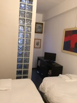 Center, wi-fi, air-conditioned, utilities room and bathroom linen cleaning included.