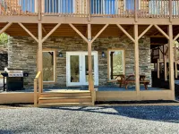 New cabin with king size bedrooms, en suite bathrooms, smart TV, decks & views.