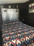 Dog friendly cozy red cottage near lakes and trails
