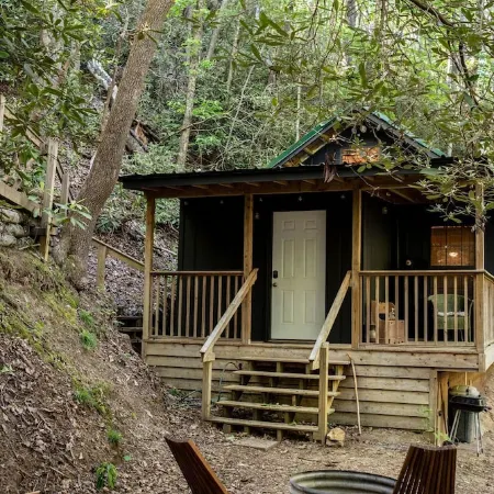 Remote cabin with creek and waterfall views 10 min from town