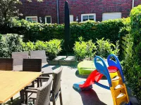 First class house close to the beach, fenced garden 8 adults + children