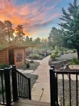 Cheerful Cabin with large stone patio and hot tub, next to trails!!