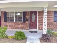 Charming 4 bedroom / 2 bath Home Walking Distance To Beach