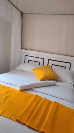 Lux Suites Mellow Apartments Kitengela Отели в г. Olooloitikosh