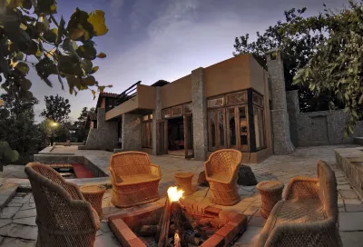 Pugdundee Safaris - Kanha Earth Lodge Hotels in Lamna