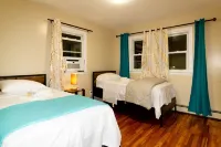 Cheerful & Beautiful 3-Bedroom Ranch Hotels in Merrick