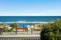 "Oceanfront Oasis: A Tranquil Retreat Steps from the Sea!