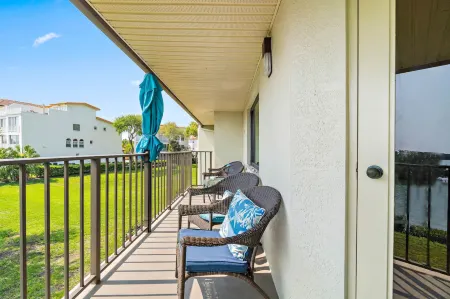 Private Balcony and Resort Amenities - Gorgeous Waterfront Retreat