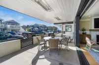 Cozy Patio with Heater and BBQ - Stylish Coastal Escape