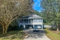 Sprawling coastal home with front porch, separate apartment, & AC - dog-friendly Hotels near Wacca Wache Marina