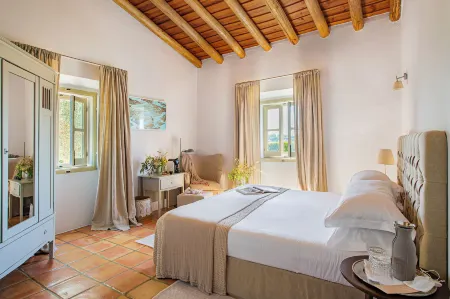 Herdade da Malhadinha Nova - Relais & Châteaux Отели в г. Алберноа