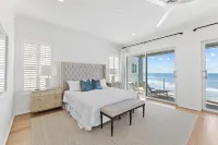 Gulf Front Luxurious Home with Private Pool and Beach Access 6 Bedroom Home by RedAwning