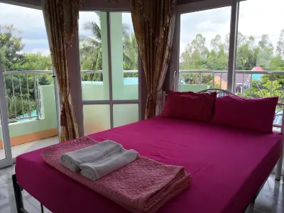Turfan Hotel and Tigger Park Hotels near Wat Si Sawamg