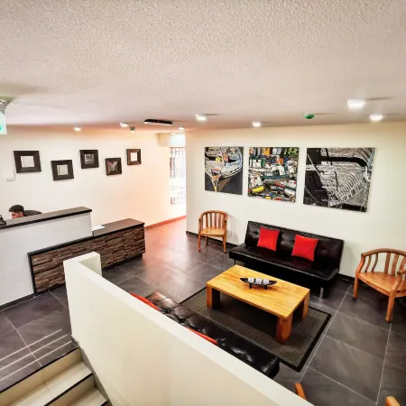 Apart Hotel Viva Providencia Отели рядом с достопримечательностью «Торговый центр Paseo Quilin»