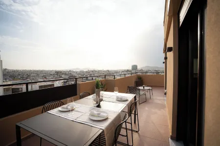 Ikima Living Отели рядом со станцией Piraeus Railway Station