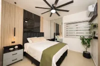 Dream Stay - Pool & Gym - 10Min Airport & Homs