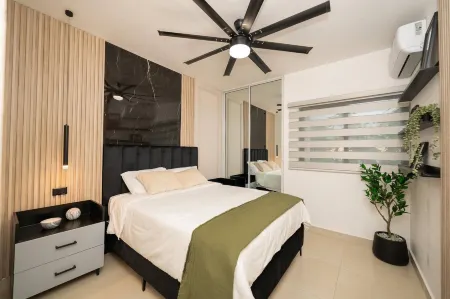 Dream Stay - Pool & Gym - 10Min Airport & Homs