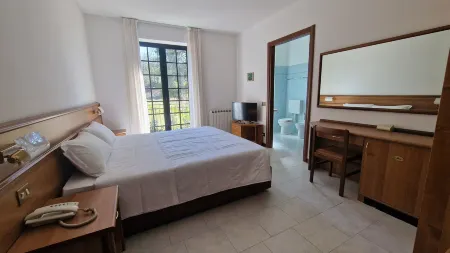 Hotel Montegrino Lakeview Отели в г. Carmine