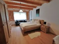 Spacious, sunny country house in the Alps with its own garden