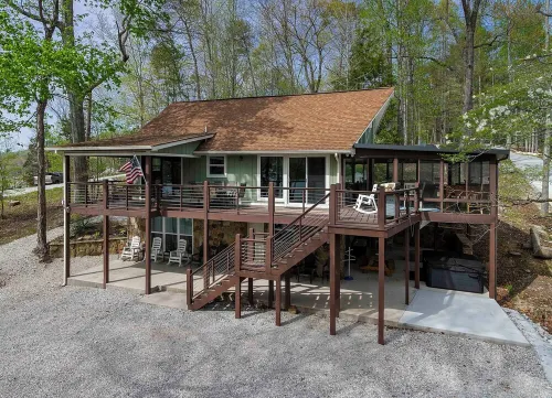 A Shore Thing - no steps to dock! Hot tub, fire pit ~ Sleeps 22 ~