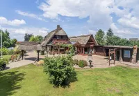 Holiday on the "Eulenhof" directly on the Este in the old country Hotel a Jork