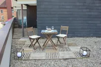 1-room apartment with large balcony, sauna + swimming pool in the house