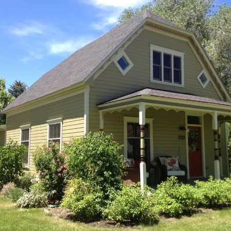 Charming studio cottage on quiet street with beautiful landscaping and gardens.