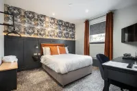 The Coachman Hotel Отели в г. 