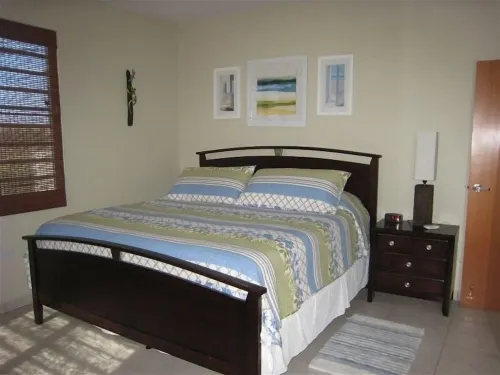 Spacious, attractively decorated 2 BR 1bath gated Apt, 4 Mins to Jobos Beach