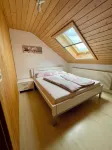 Modern top floor apartment with spacious outdoor area in a quiet location