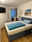 Direct lake view, charming apartment with balcony, swimming pool, playroom, parking space. Hotel dekat Scharbeutzer Strand Ostsee