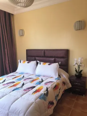 Résidence du Golf in Bouznika-Plage with 2 swimming pools; Hotels near Plage David