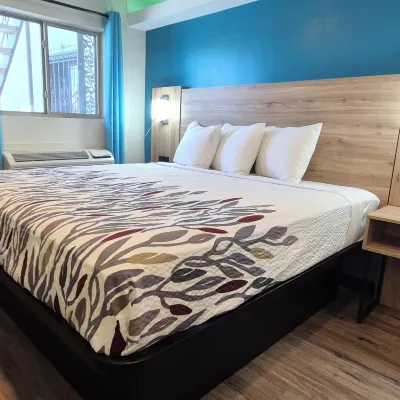 Exclusivo Inn by OYO Grand Prairie, TX โรงแรมใกล้สวนสนุกซิกซ์แฟล็กซ์เฮอร์ริเคนฮาร์เบอร์