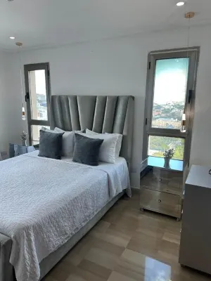 Apartamento con vista mar y la ciudad La Gloria Malecón Santo Domingo Отели в г. 