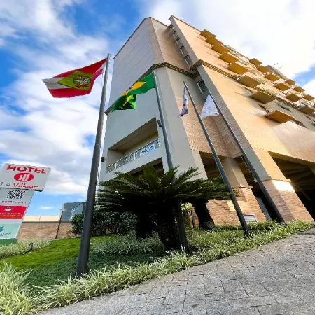 Le Village Flats e Hotel
