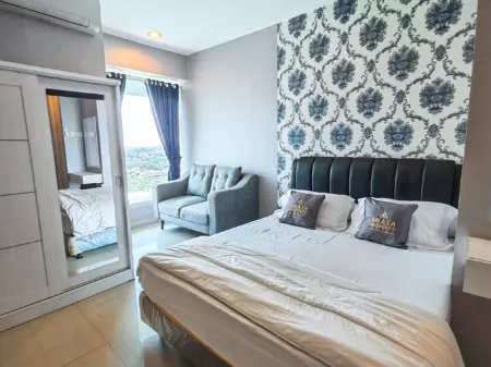 Apartemen Grand Kamala Lagoon Bekasi by Aparian Отели в г. West Bekasi
