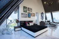 Woods the Clubhouse - Mangalyam Meadows فنادق في Valsad