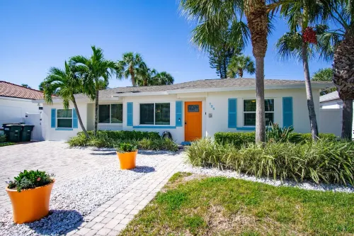 4-Bed Coastal Retreat: Heated Pool, 200 Steps to Beach, Walk to Fun!