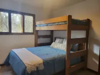 Beautiful remodeled 3 bed 2.5 bath cabin with a huge deck backing to the forest!