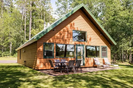 Secluded 4-season cabin w/private waterfront, epic game room & mins from trails